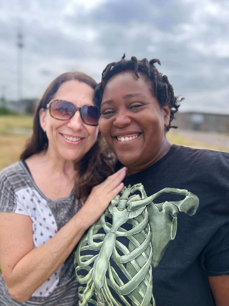 ComFe Our team leader Betty with a guest all smily.