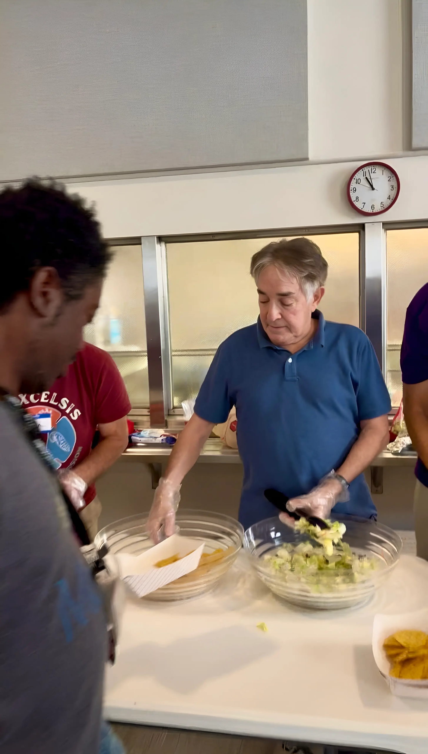 Late Rate Hartmann, serving meal at the inExcelsis ComFe. 