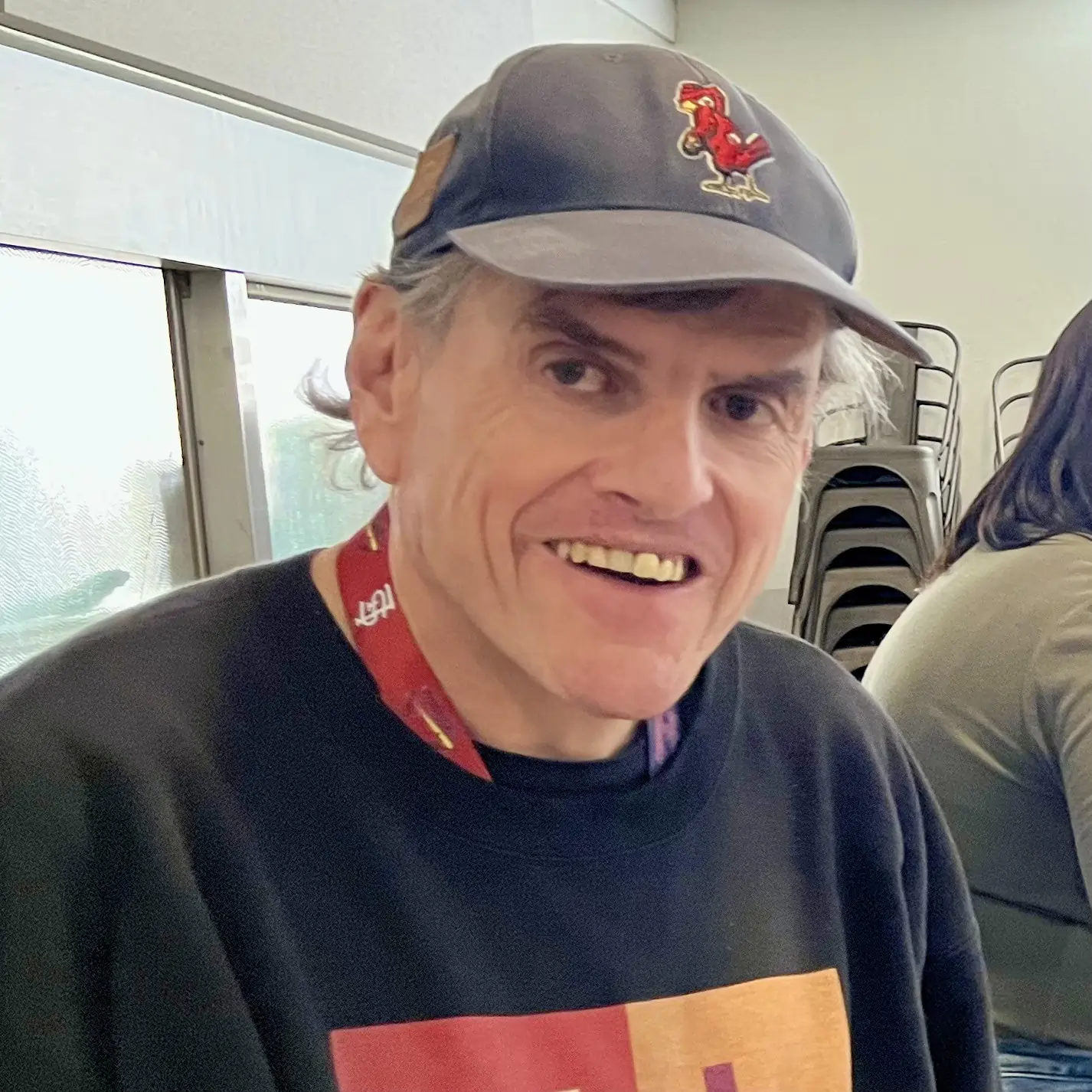 John all smiley at the community outreach during lunch.