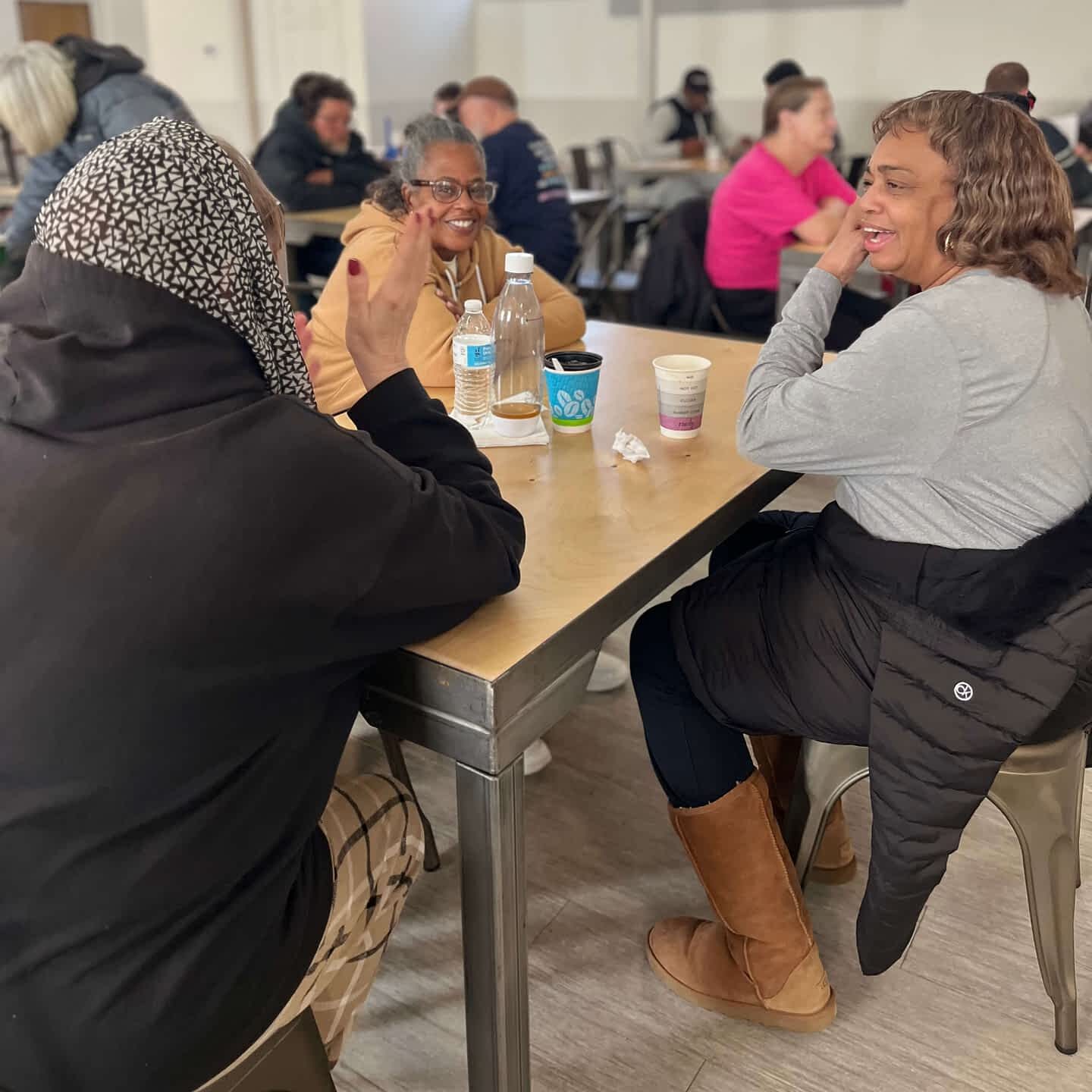 Ms. Bonnie fellowshipping with the guests at ComFE